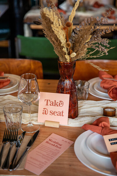 Groomsmen and small son in matching tux outfits