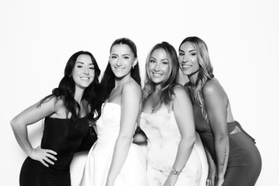 Girls having fun with portrait print booth in Vancouver