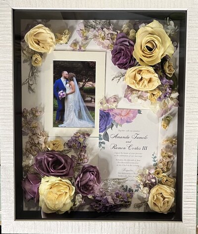 Beautiful floral preservation shadow box featuring a wedding bouquet by Leigh Florist.