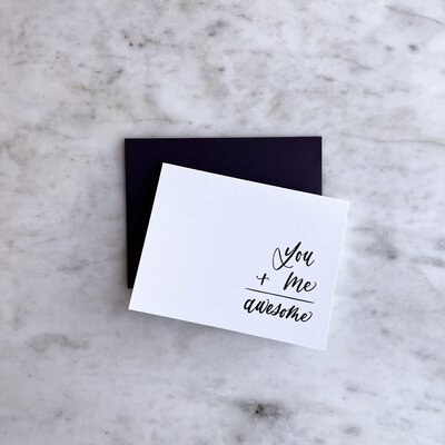 Card that reads "You + Me = Awesome" in cursive script