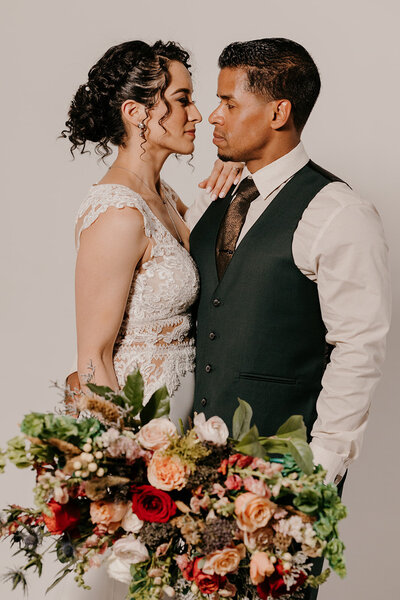 Bride and groom look at one another