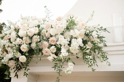 floral design on fireplace at luxury reception design