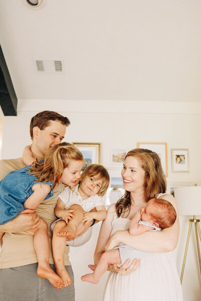 a couple and their newborn baby during their Houston newborn session