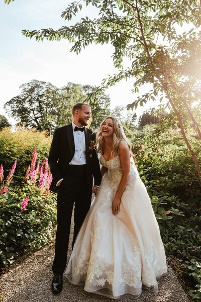 Bride and Groom at Middleton Lodge walled garden in the sunshine
