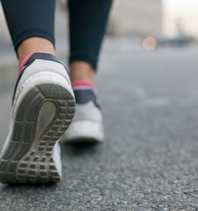 Closeup of woman's sneakers while walking