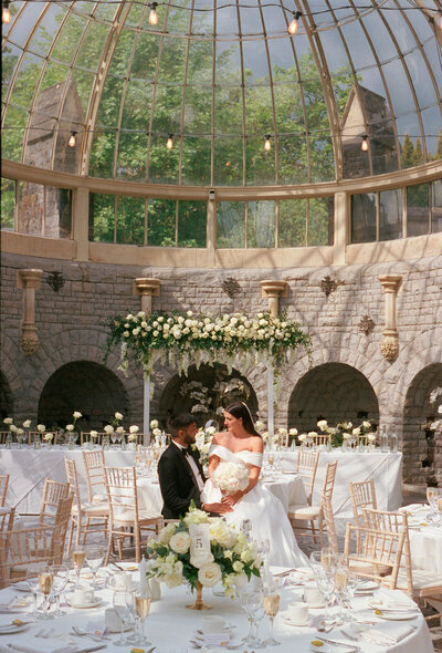 35mm couple portraits in the Orangery at Tortworth Court, Cotswold wedding venue