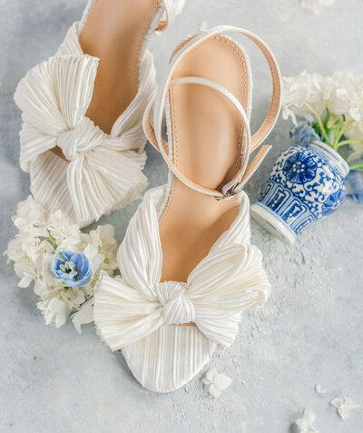 Brides shoes on a blue background