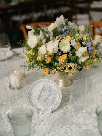 Hand lettered table number on blue and white pottery for wedding at Lion Rock Farm in Connecticut