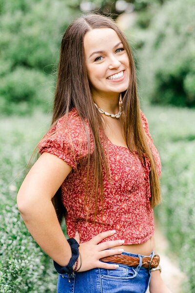girl wearing cropped top smiling during Warrenton, Virginia photos