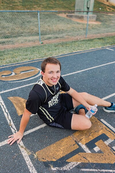 Senior smiling during an outdoor portrait session in Staunton, VA, capturing genuine personality