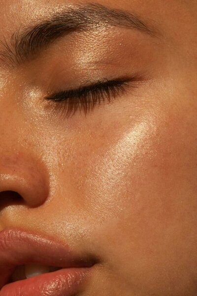 Close-up image highlighting clear and radiant skin, representing the focus on achieving skincare goals at The Complexion Club, a skincare club with an aesthetic-forward website.
