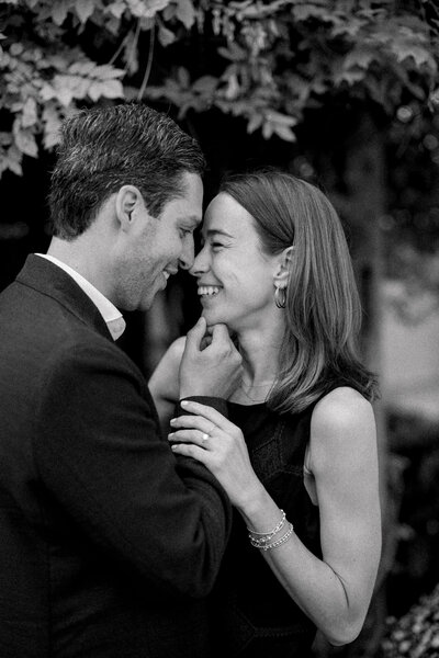 Intimate Fredericksburg proposal moment in black and white.