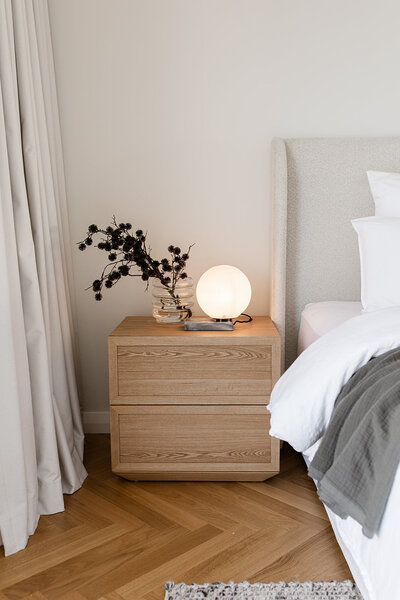 Oak bedside table with timber floors