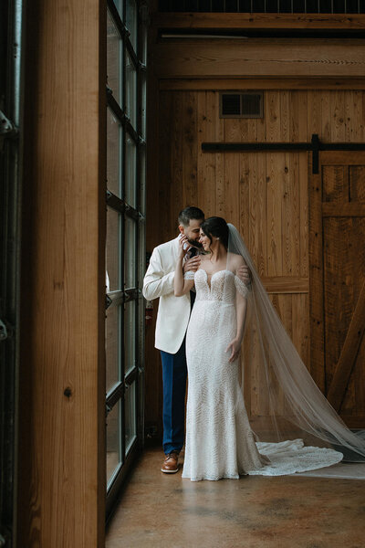 bride and groom portrait against black background taken by fargo wedding photographer kiella lawrence