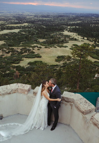 Bride and Groom hold hands at the Denver Botanic Gardens.