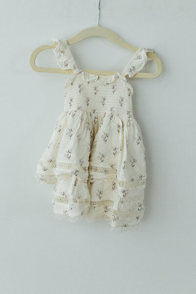 white floral nora lee brand baby dress