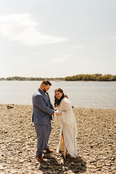 A couple saying their vows at Mackworth Island Photographed by Hattie Mae Photography