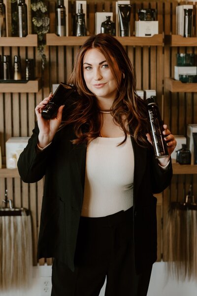 Jaycie Rusconi, salon owner and stylist at The Jaycie Collective in Salem, Oregon, working with a client.