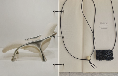 Minimal editorial-style flatlay showcasing a sculptural silver chair detail and a black beaded necklace on an open textured book, evoking modern, tactile design aesthetics