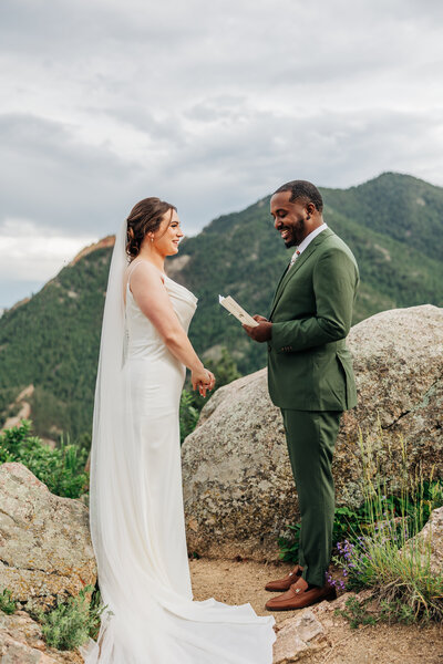 Boulder Wedding Photographer captures groom reading vows