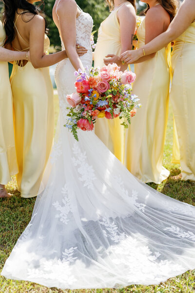 Brides wedding heels in her lace gown