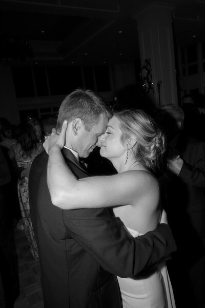 A groom dipping a bride