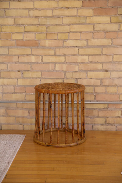 A round rattan coffee table.