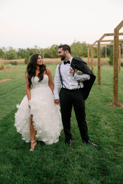 Bride with soft Hollywood waves and natural bridal glam for an outdoor Maryland wedding — styled by Klover Beauty.