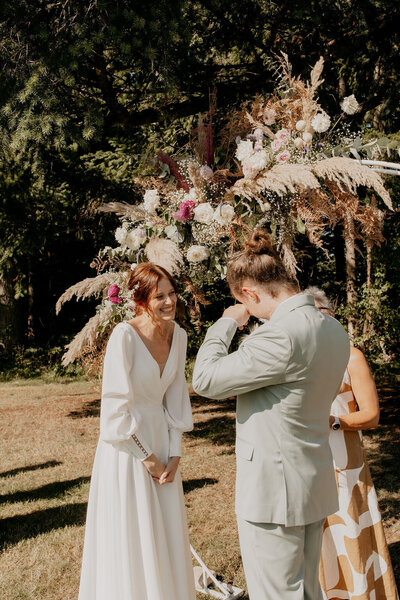 Bride and groom at altar.