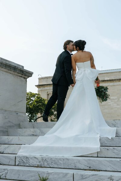 Wedding couple from the Madison took their couples photos at the Cleveland Museum of Arts by April Graber Photo and Video