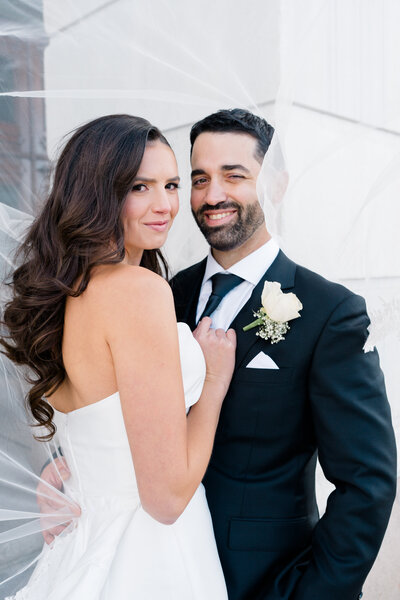 Newport Wedding Photographer | Rhode Island Caprio Captured Photography | Bride And Groom Embracing And Smiling
