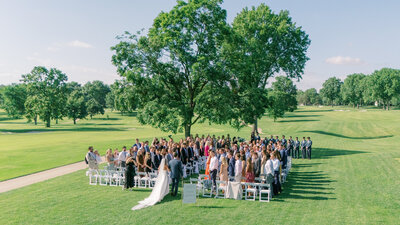 Cassidy Drury, Kansas City wedding photographer with a fine art style