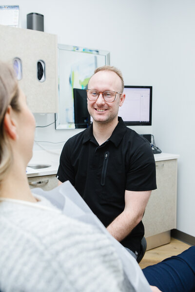 Dr. Tyson reminds patients to avoid hard or sticky foods, wear a nightguard if grinding teeth, and reduce smoking to protect their dental prosthesis and support long-term oral health, at our clinic in Lethbridge, Alberta