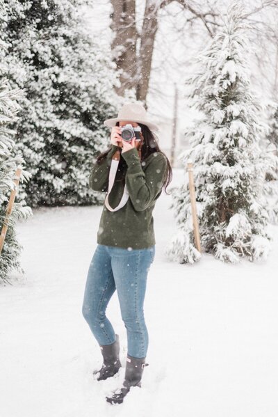 jacqueline taking photo in the snow