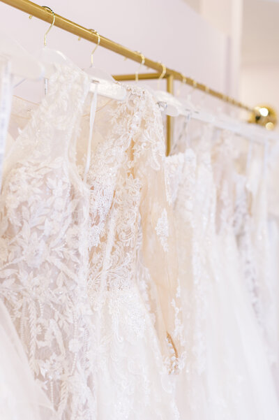 Designer Dresses on a Rack - Bride to Be Boutique