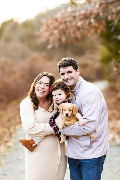 new jersey photography
 of family sitting in a field