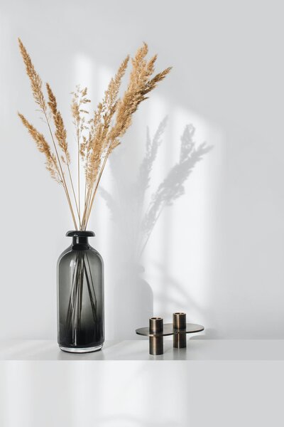 vase and wheat on shelf