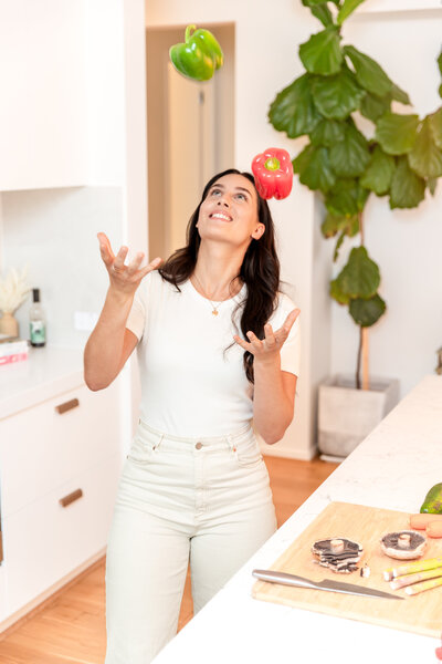 Megan Boswell eating disorder dietitian enjoying Brisbane Queensland lifestyle - cooking experimenting with recipes and food freedom approach