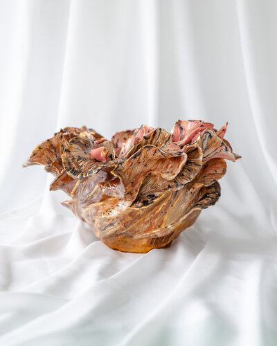 New Zealand-based product photographer capturing the intricate designs of Gerda Satunas' ceramic art.