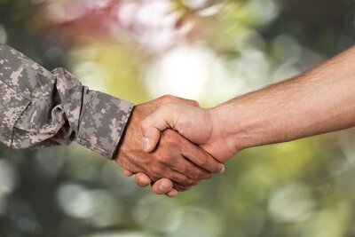 Veteran employment handshake military civilian