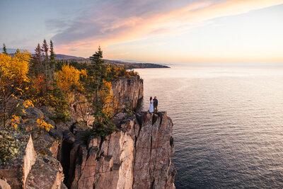 couple standing on the cliffs in colorado taken by Minnesota wedding photographer Marcus Hanenburg Photography