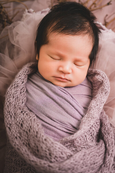 Sleeping newborn wrapped in linen — elegant Marin County newborn photography