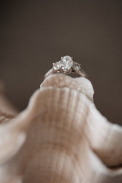 Elopement Photography, wedding ring on top of a seashell macro