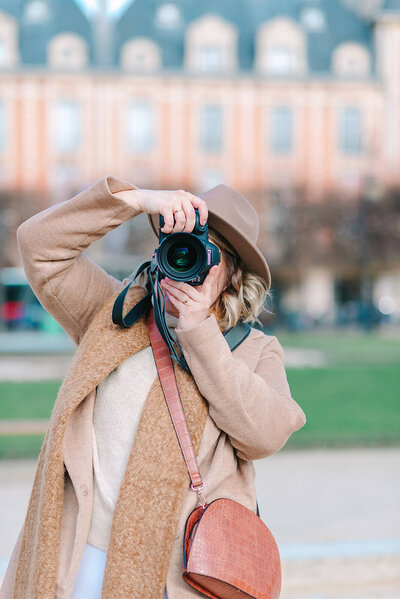 Rachael Laporte, Paris Photographer, holding and shooting camera during photoshoot