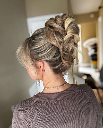 High bridal bun styled for perfect braid— clean, elegant look by Klover Beauty for a Maryland bride.