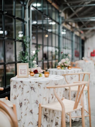 Cocktail tables with floral tablesloths