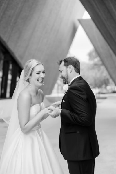 A sweet black and white moment between bride and groom after their first look in Winter Park by Angelika Krug Photo & Film
