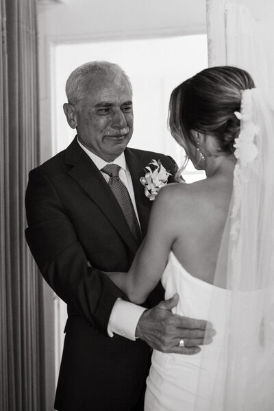 Candid wedding photo of couple’s laughter captured by  Honolulu wedding photographer