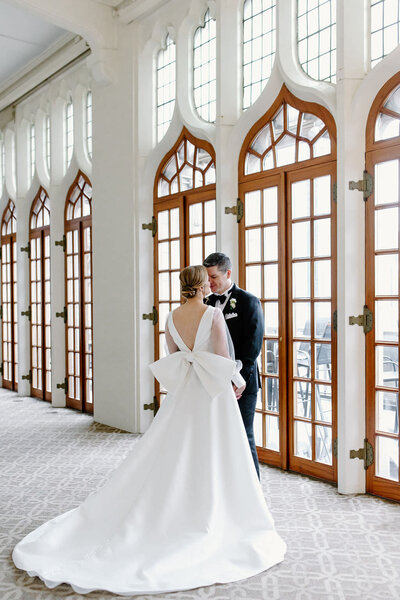 Bride and groom embrace at the University Club of Chicago