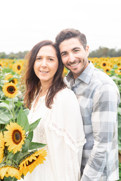 holland ridge sunflower farm engagement photo shoot